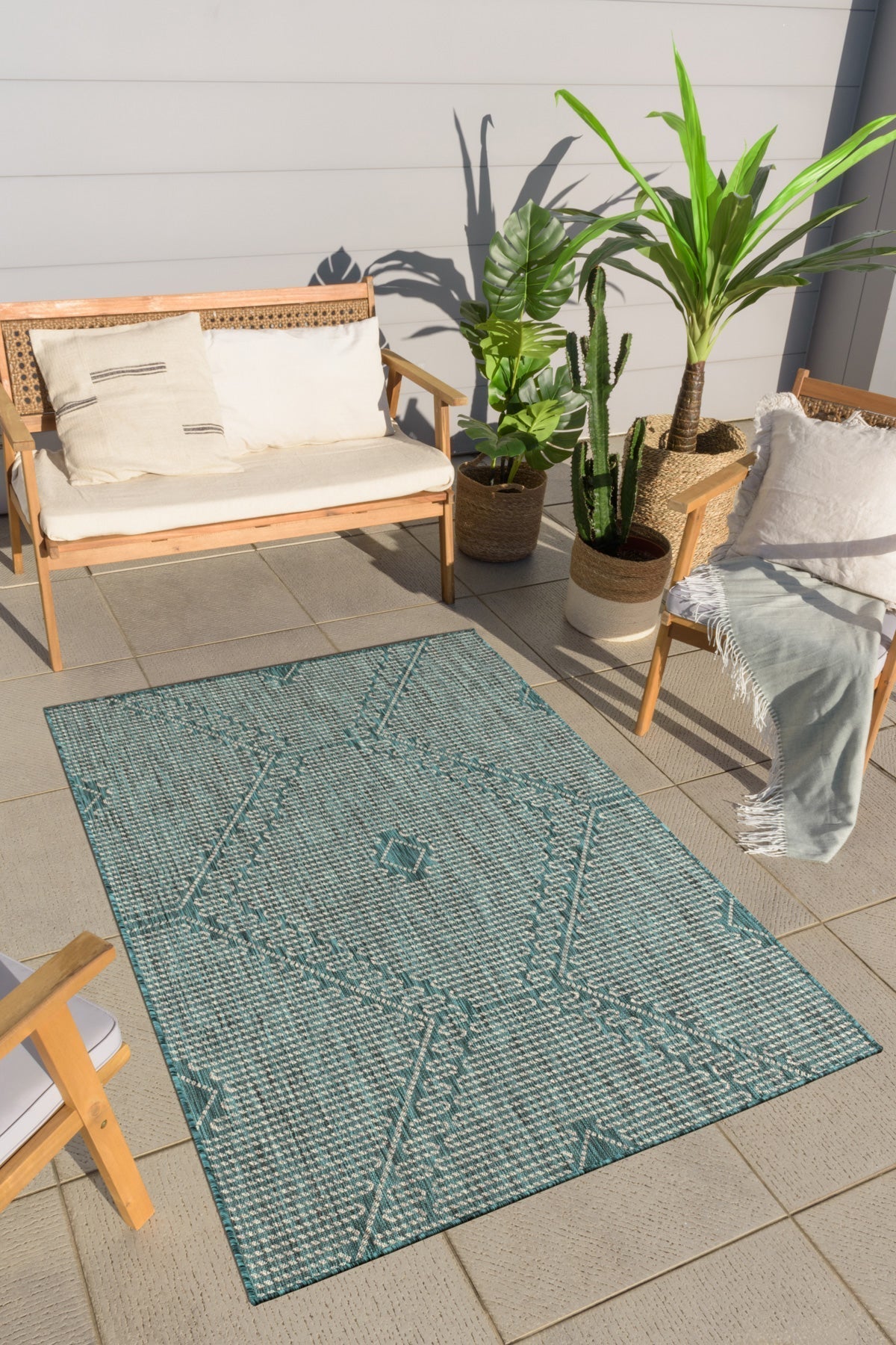 Tapis motifs géométriques turquoise Nazar rugs